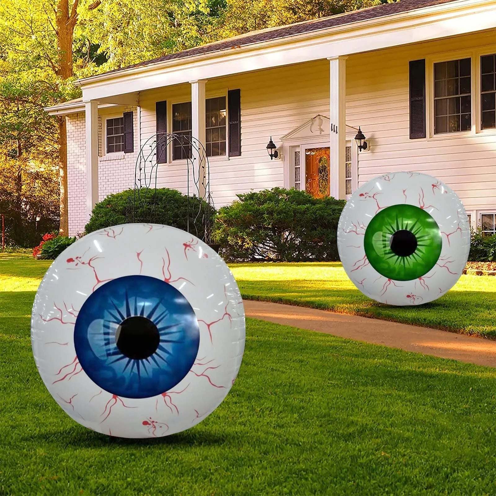 Green Halloween eyeball balloon inflated to 40 cm diameter with a detailed bloodshot pattern.
