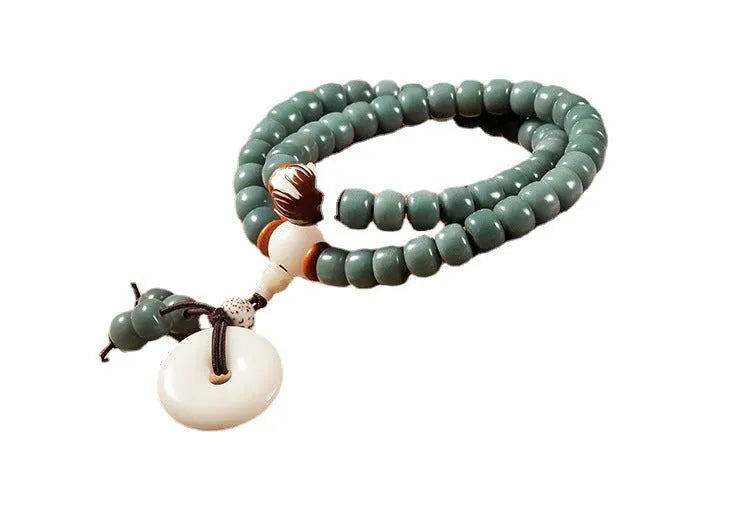 White jade bodhi green sandalwood bracelet with bead construction and double ring safety buckle