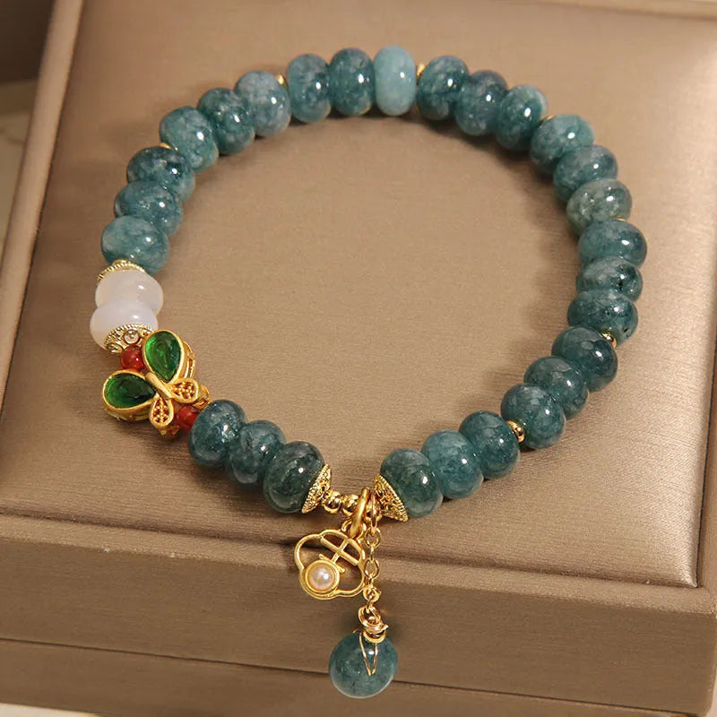 Blue water jade abacus beads crystal bracelet with butterfly clasp and white agate accents