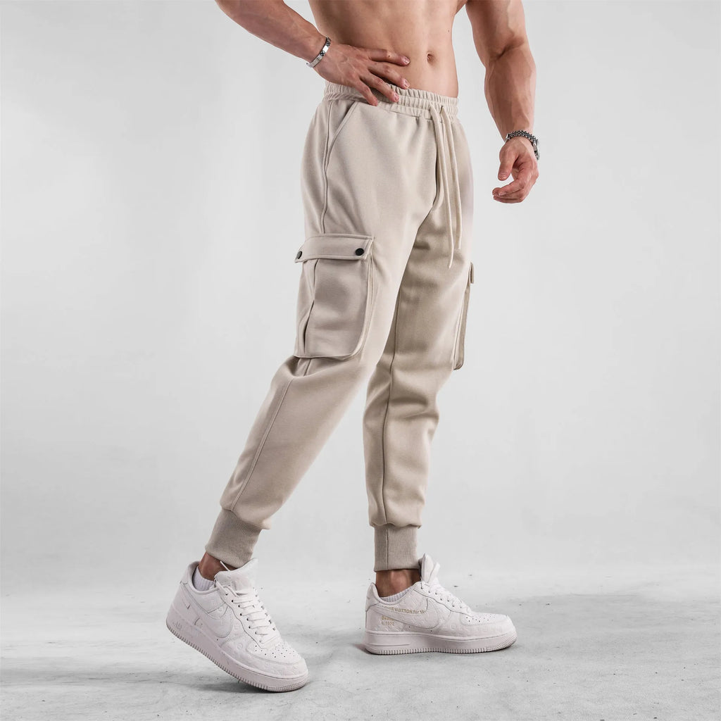 Men's loose cotton sports trousers with ankle ties and multiple pockets in various colours