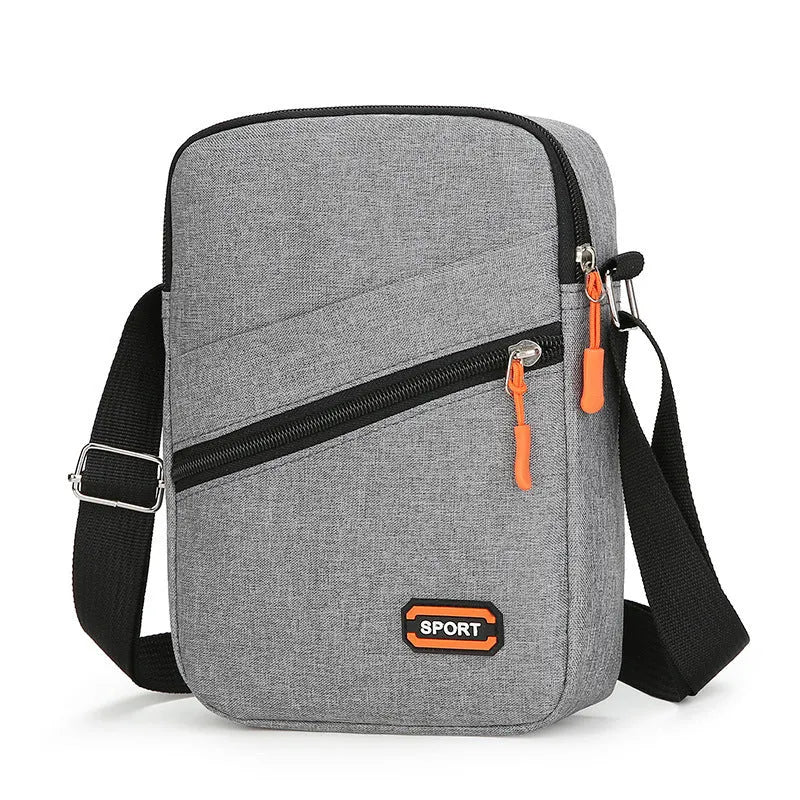 Ultra light Oxford cloth crossbody commuter bag in solid black, navy blue, or silver grey colour.