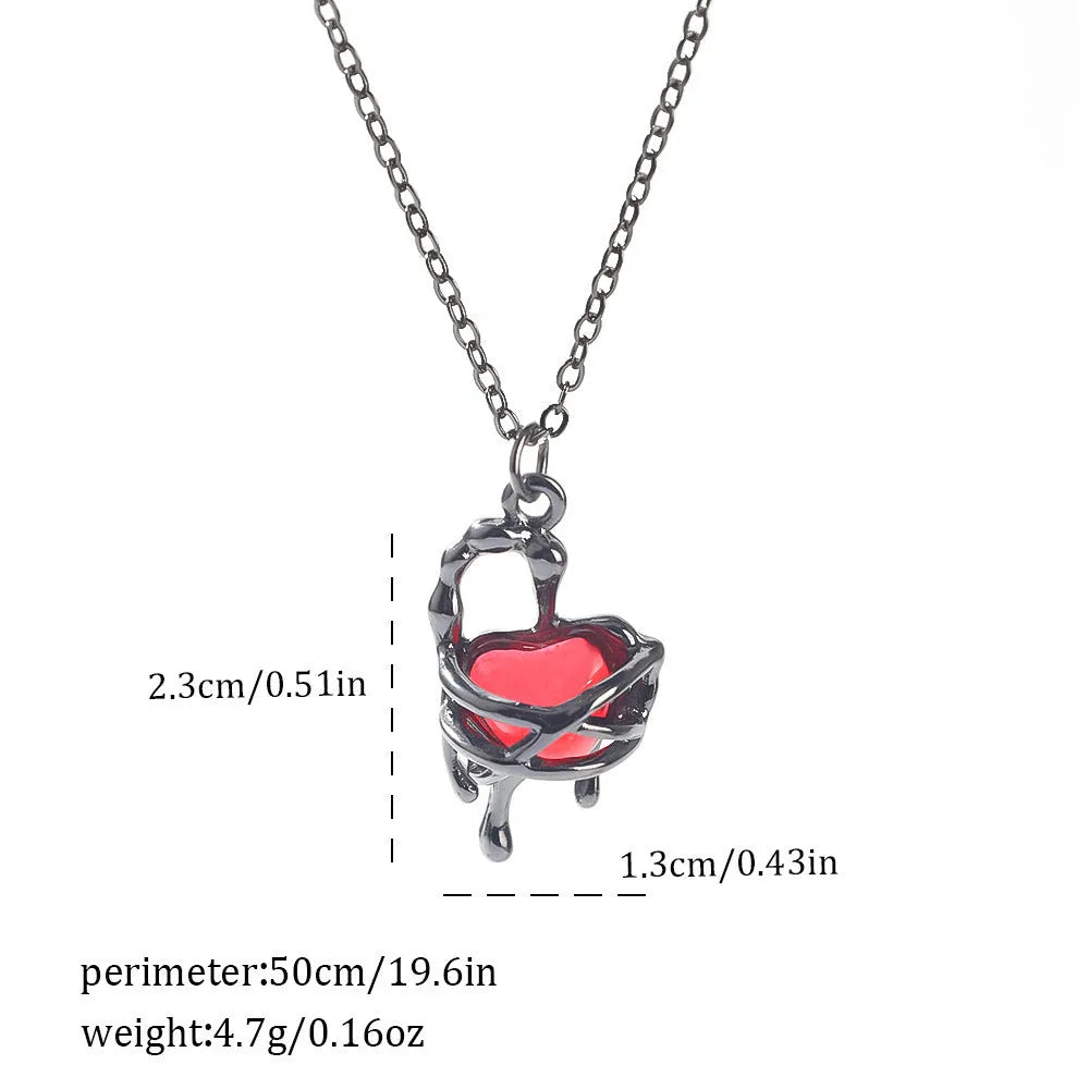 Gothic Halloween necklace with electroplated alloy pendant showing bat, spider, or cross design on a metal chain.