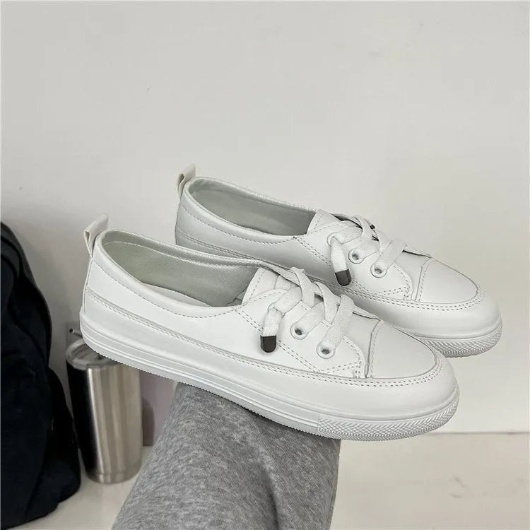 White women's sports shoes with flat heel, round toe, lace-up front, artificial PU upper, and rubber sole