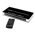 Black 4-input 1-output HDMI audio video switch with remote control on a table.