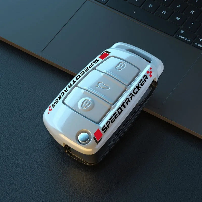 Carbon fibre style car key cover with mirror elements in carbon and white colours