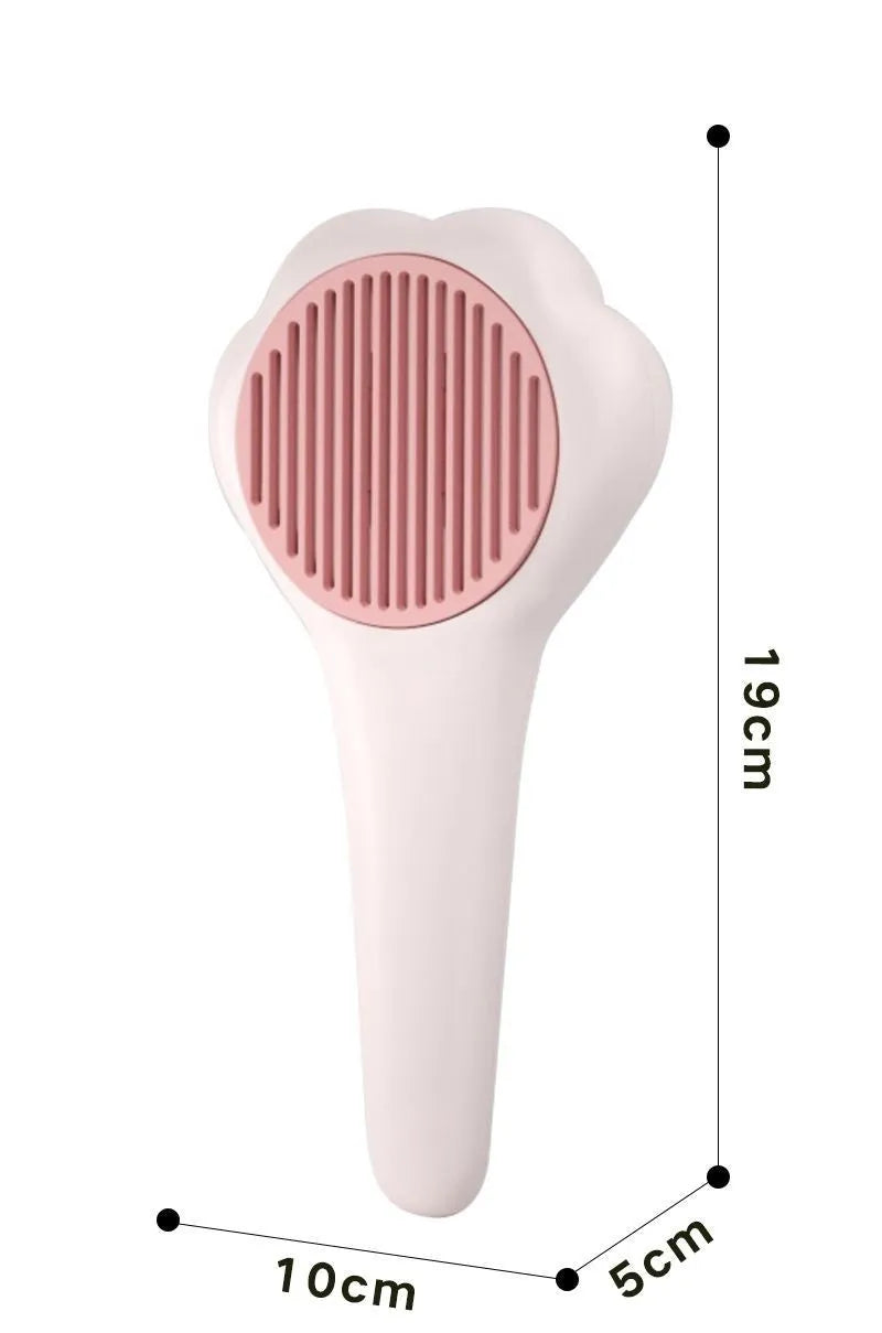 White plastic cat paw pet comb with massage action and one-click hair removal function