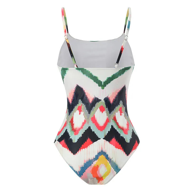 Women's two-piece beach swimsuit with matching hip skirt in striped gradient pattern