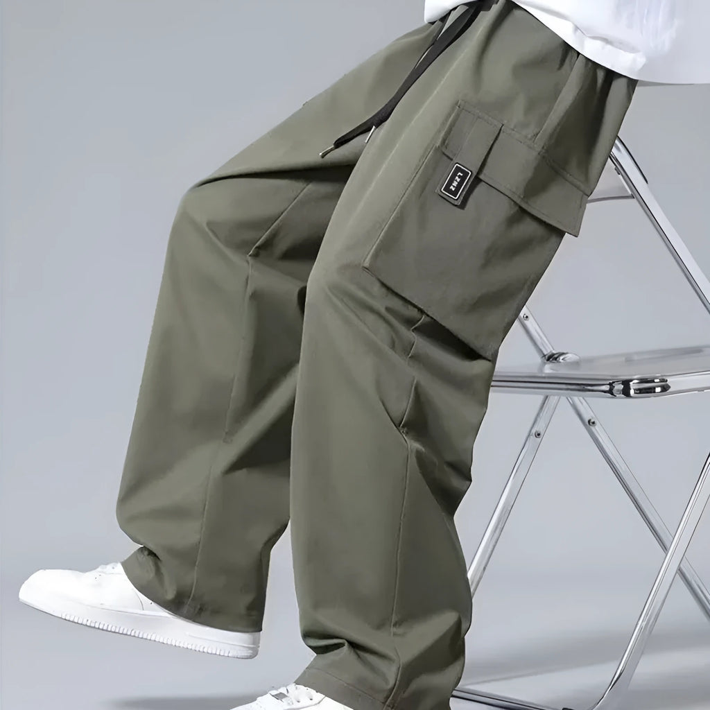 Boys straight leg cargo pants with drawstring waist and large pockets in Army Green