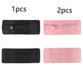 Black and pink weight-bearing hip bridge auxiliary strap for dumbbell and barbell training