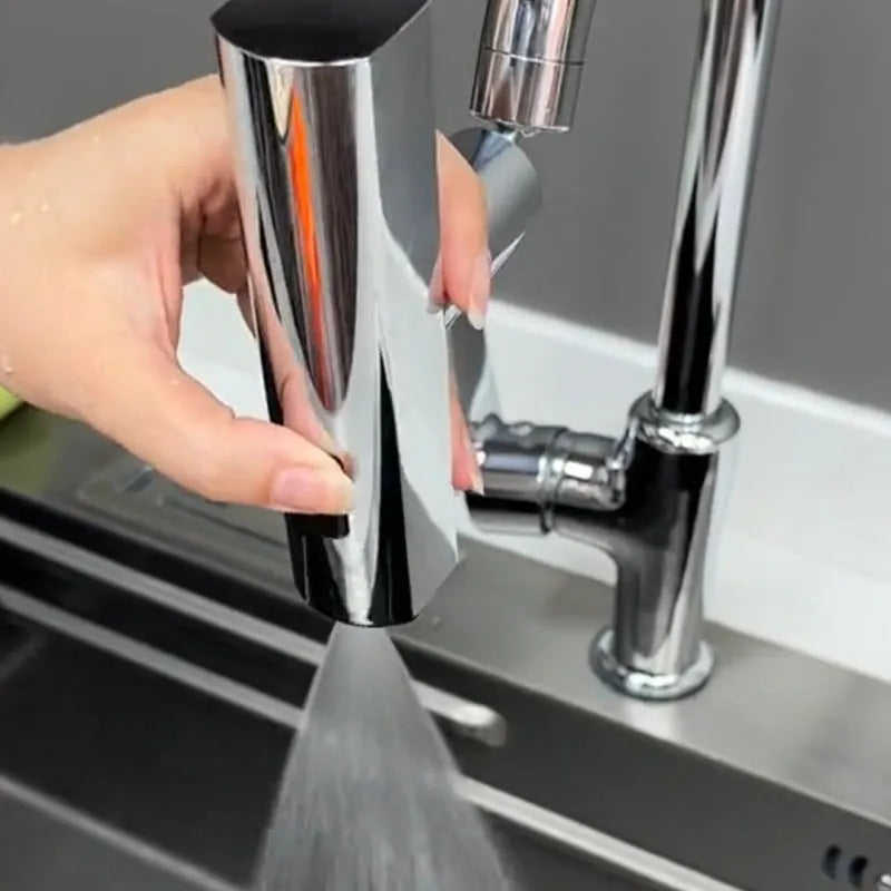 Black ABS kitchen faucet extension with rotating bubbler and waterfall outlet mode on a modern sink