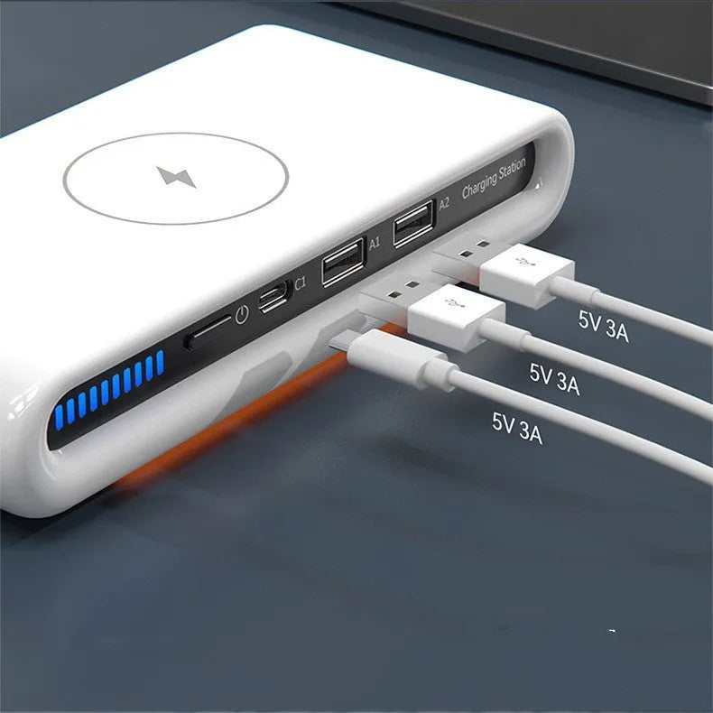 White desktop wireless charging pad with illuminated multi-colour ambient lamp ring.