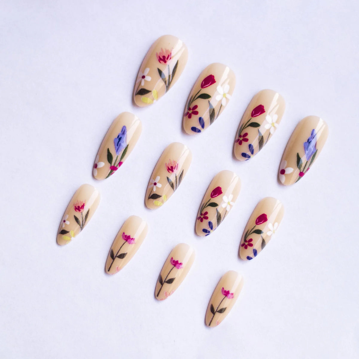 Almond-shaped removable nail wraps with European floral armour rose and tulip patterns