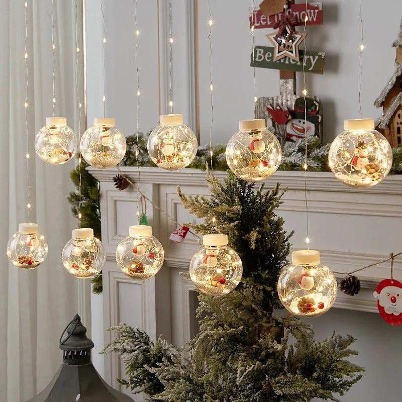 LED Christmas curtain lamp with 10 fairy ball lights featuring snowman and Christmas tree designs for window decoration