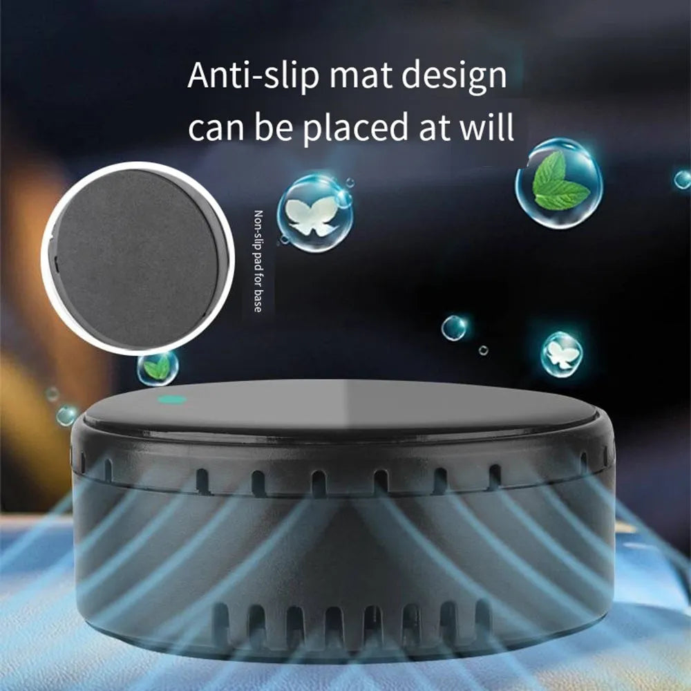 Black solar car humidifier installed in vehicle air vent showing solar panel and mist output