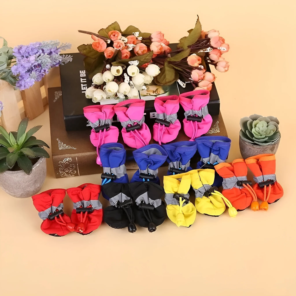 Pet dog shoes in multiple colours including rose red, black, blue monkey print, and fleece-lined options