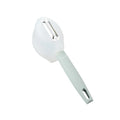 Stainless steel handle fruit peeler in pink colour with PP plastic body on a wooden surface