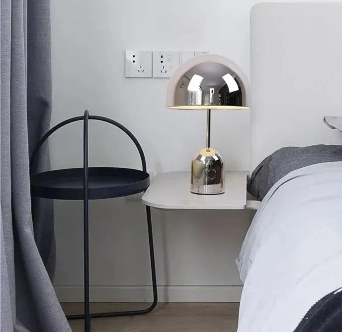 Modern mushroom-shaped table lamp with metal base in rose gold finish
