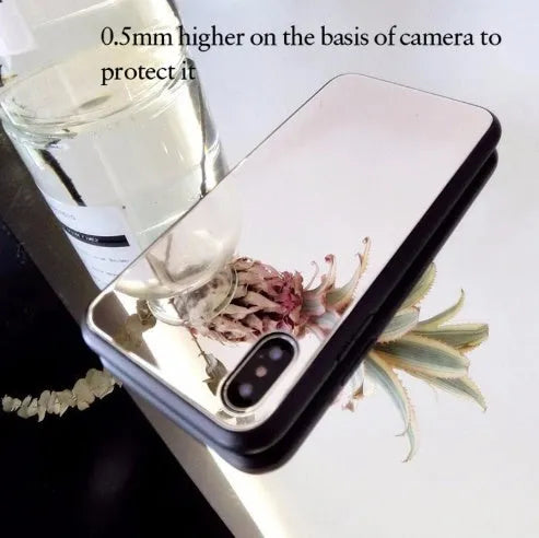 Black iPhone mirror phone case showing reflective surface, compatible with iPhone X and 7/8 Plus models.