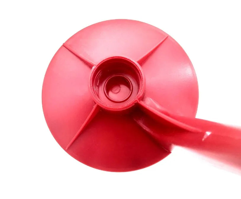 Red plastic Magic Tap soda dispenser for 2-litre bottles, 15 cm high, 10 cm diameter, with push-in tap.