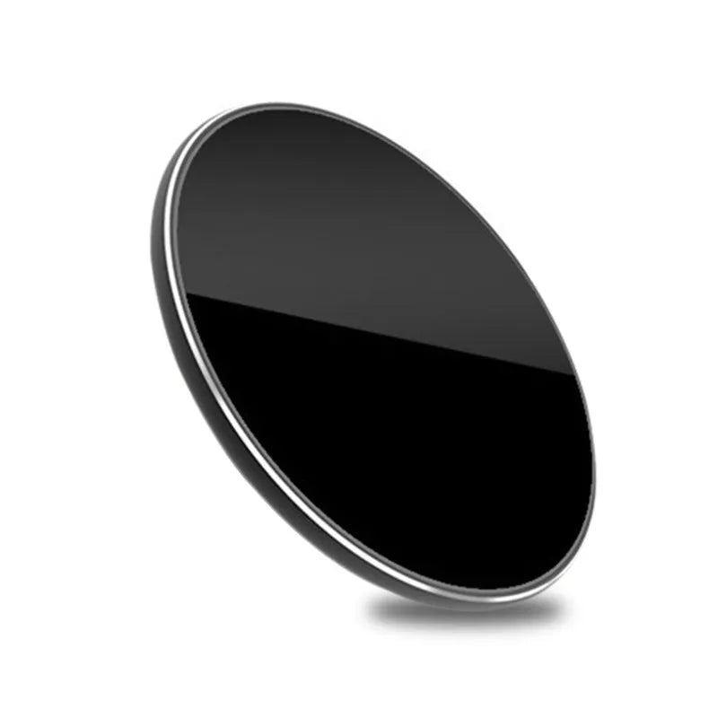 Ultra-thin aluminium wireless charging pad in silver on a wooden table