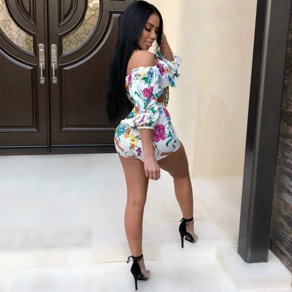Women's two-piece set with multicolour digital print, pile sleeves on crop top, and matching shorts.