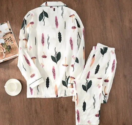 Traditional polyester maternity pajama set with turn-down collar, full bell sleeves, and ankle-length trousers in solid natural colour