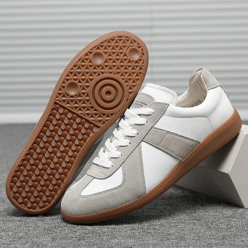 White Japanese-style retro low-top sneakers with matte upper and lace-up front