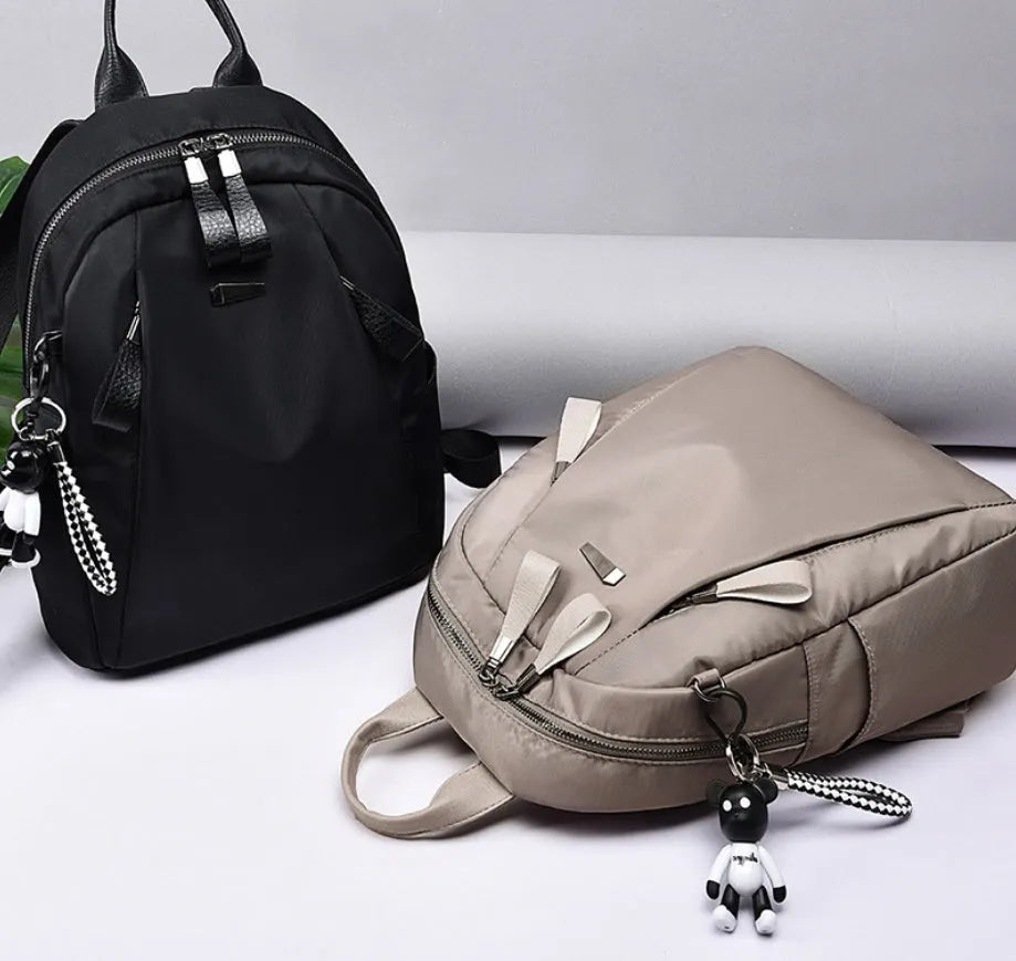 Medium square rucksack in Oxford cloth with double straps and internal organisation pockets