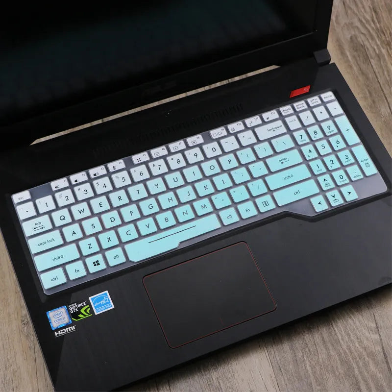 ASUS Flight laptop keyboard protective film cover in multiple colour options showing translucent and gradient designs