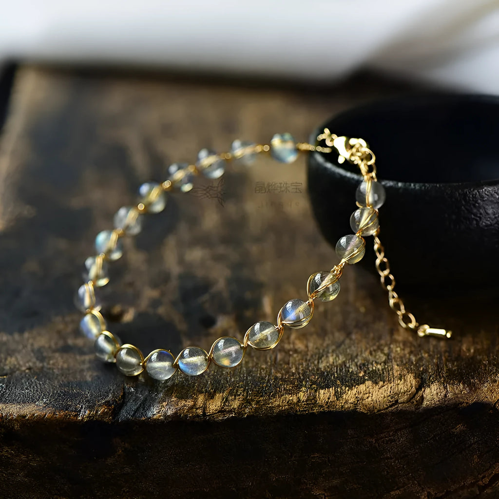 14K gilded blue moonstone bracelet with 6mm crystal gemstones and metal elements