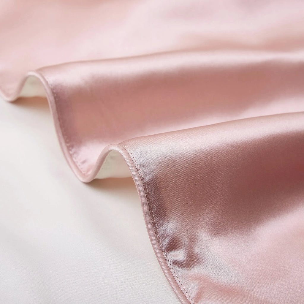 Single mulberry silk pillowcase in palace luxury style, colours include purple, blue, and gold.