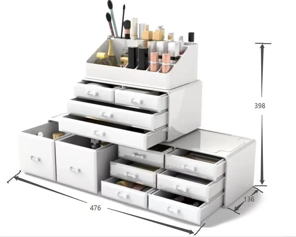Acrylic three-layer cosmetics storage box in transparent finish with organised compartments on a dressing table