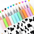 Pack of twelve assorted colour gel pens with 0.38mm fine tips and plastic cow print design barrels.