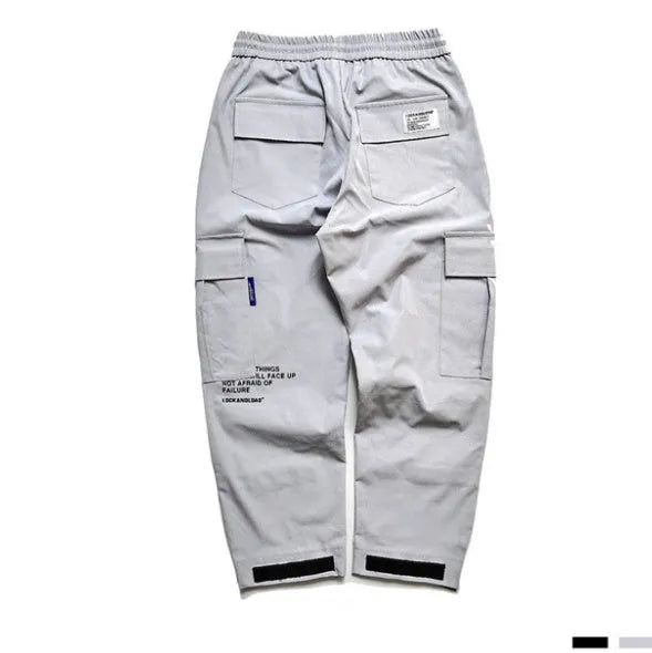VantageGo cotton streetwear joggers in Black and Grey, sizes M to 2XL, with centimetre size chart