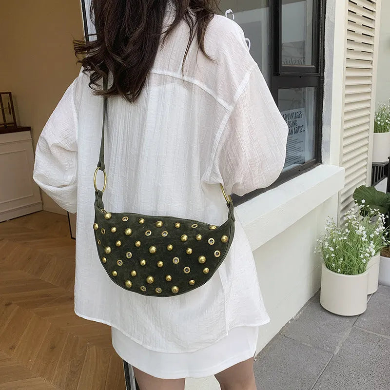 Retro rivet bag in frosted imitation buckskin suede with dumpling shape and sewing line details