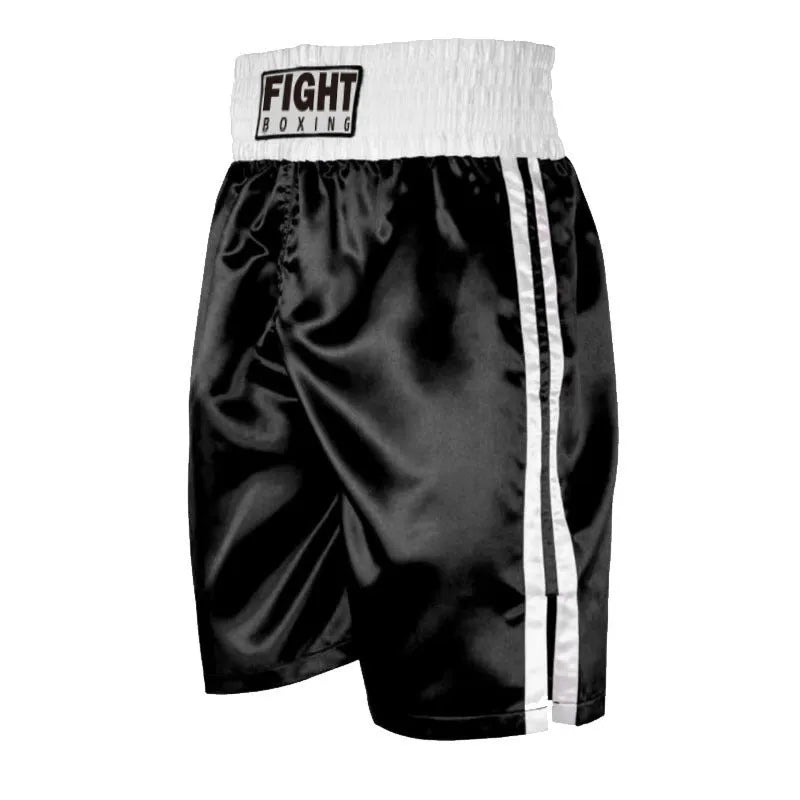 A pair of black and gold waist boxing shorts with an elasticated waistband and drawstring.