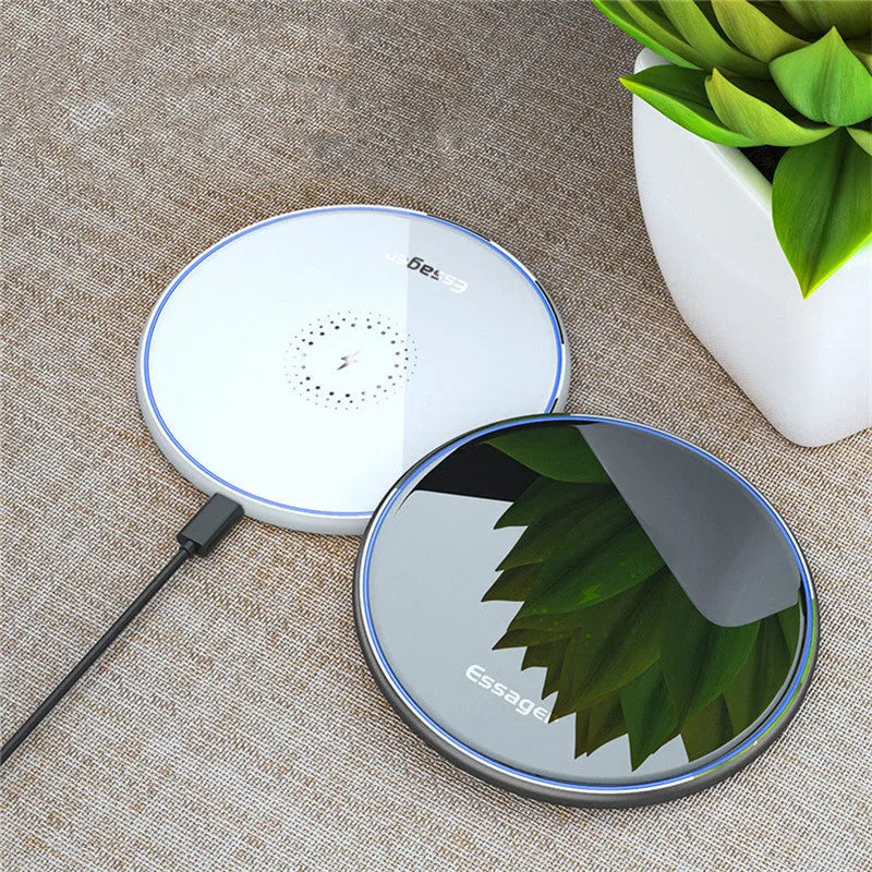Black wireless charging pad with LED indicator light for phones and headphones