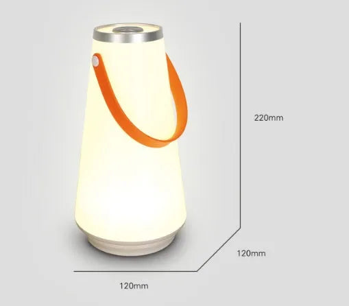 White rechargeable LED bedside night light with touch control on a wooden table.