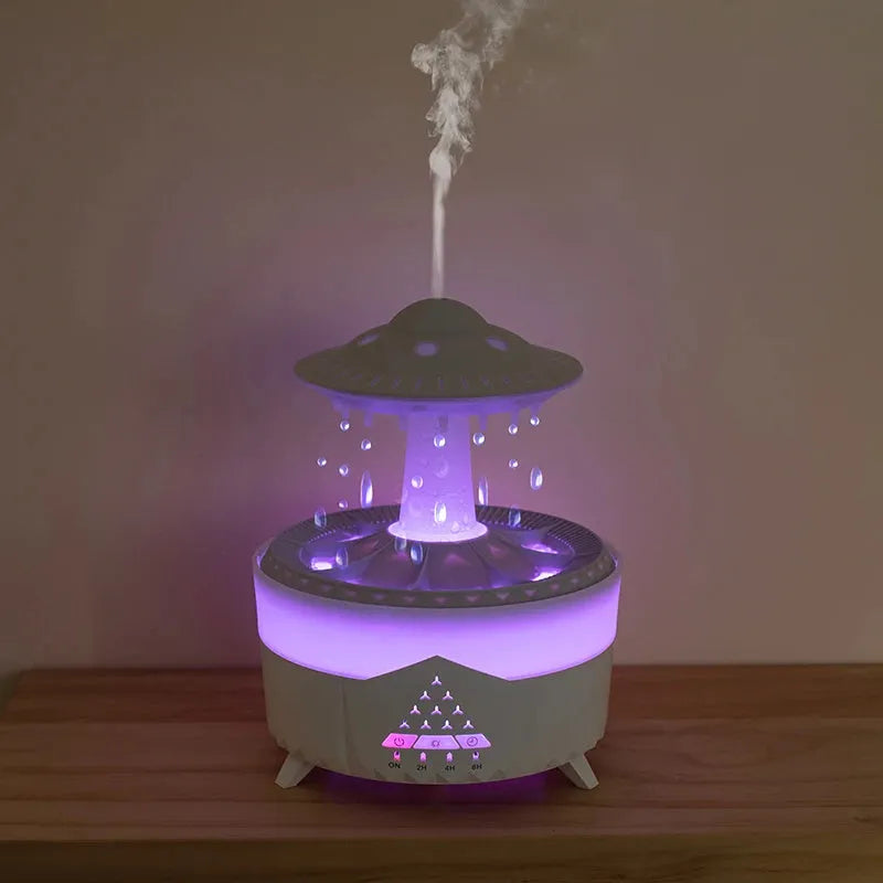 White UFO Raindrop Humidifier with 7-colour nightlight and essential oil diffuser on table