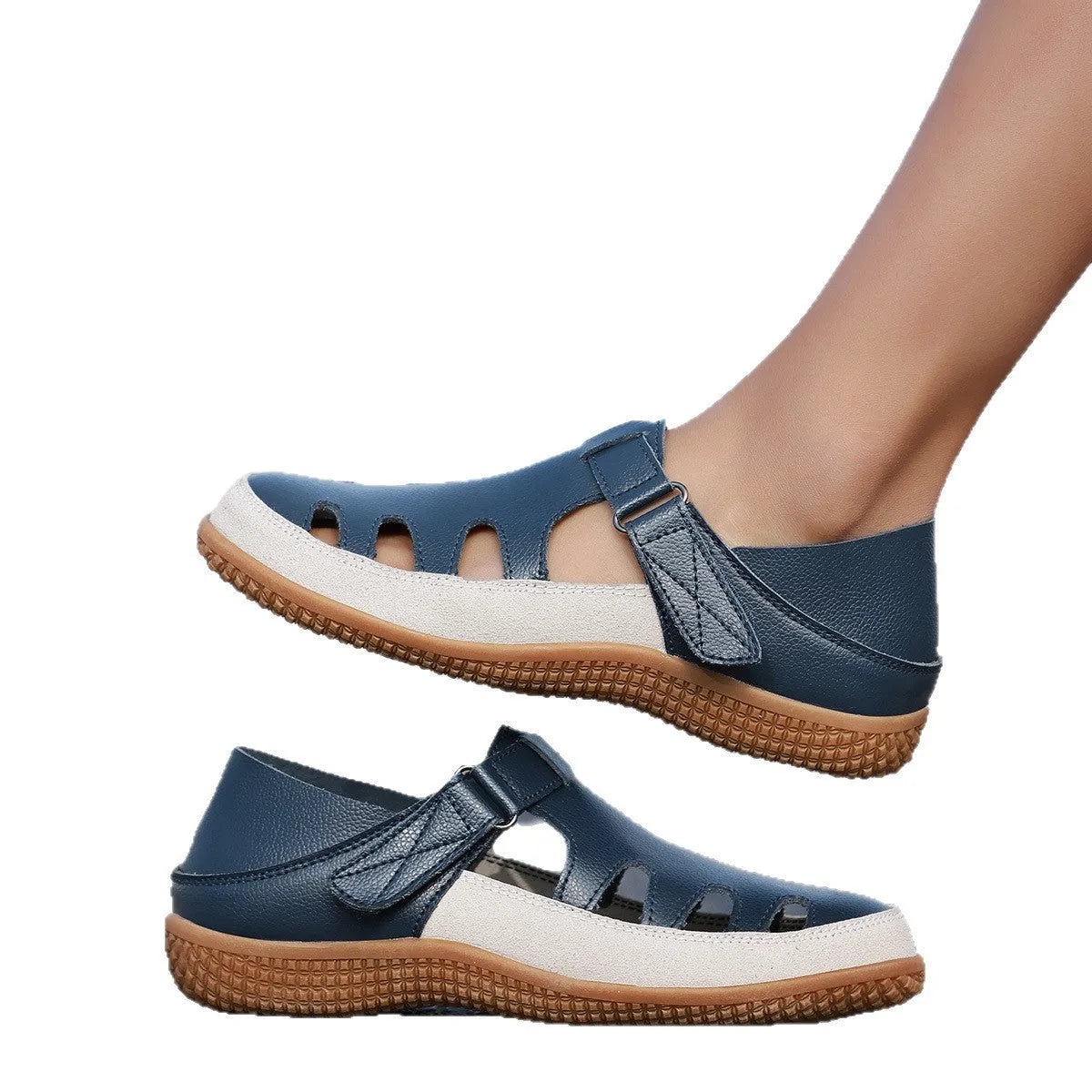 Women's plus size flat heel sandals with hollow out toe cap design in blue colour showing rubber sole