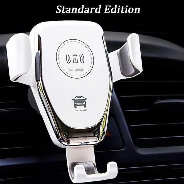 Black car wireless charger mount holding iPhone with automatic clamping arms on car vent