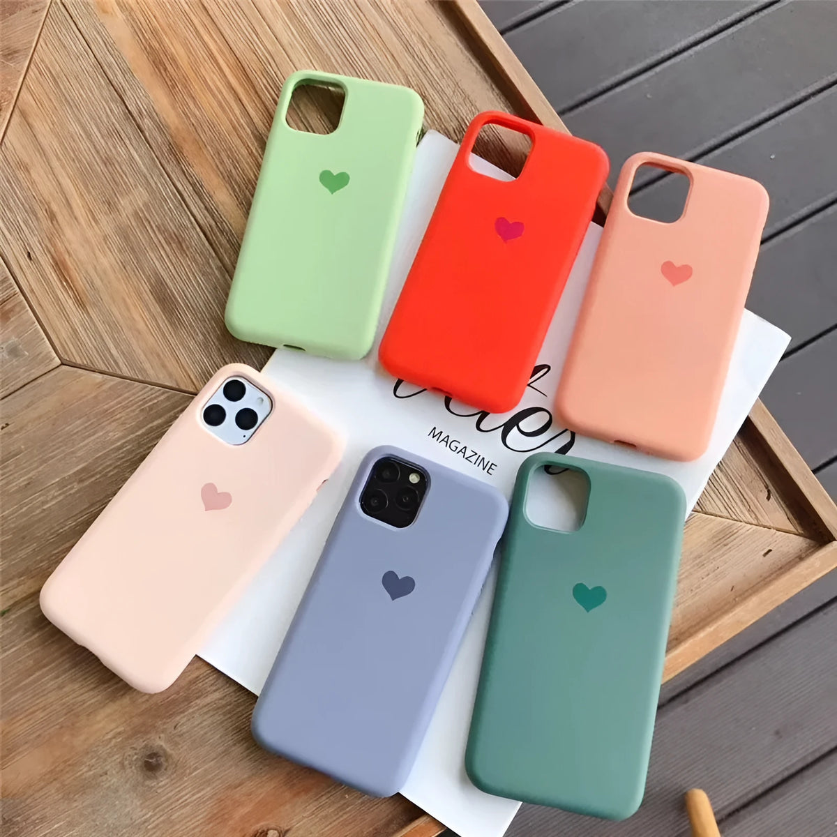 Solid-colour silicone iPhone case shown in multiple colour options