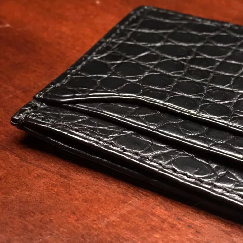 Genuine leather card wallet with crocodile pattern and checker design, shown in black and coffee colours