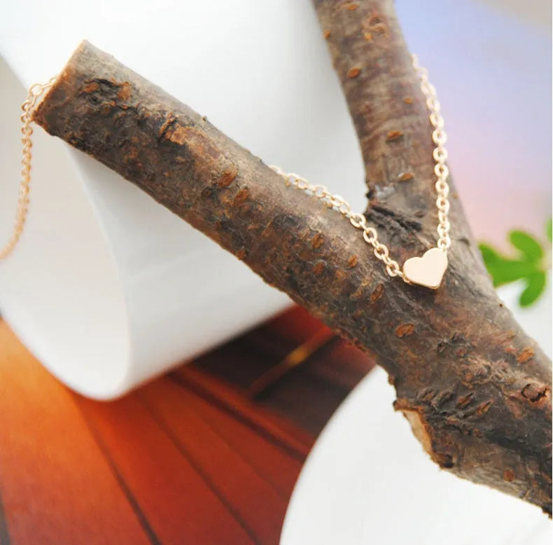 Heart & Soul choker necklace with gold plated heart-shaped alloy pendant on simple chain