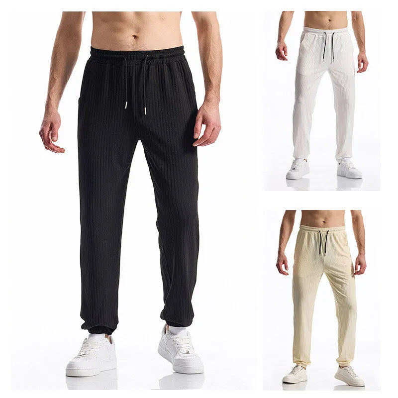 Silky rib fabric baggy straight casual trousers in black with drawstring waist and belt