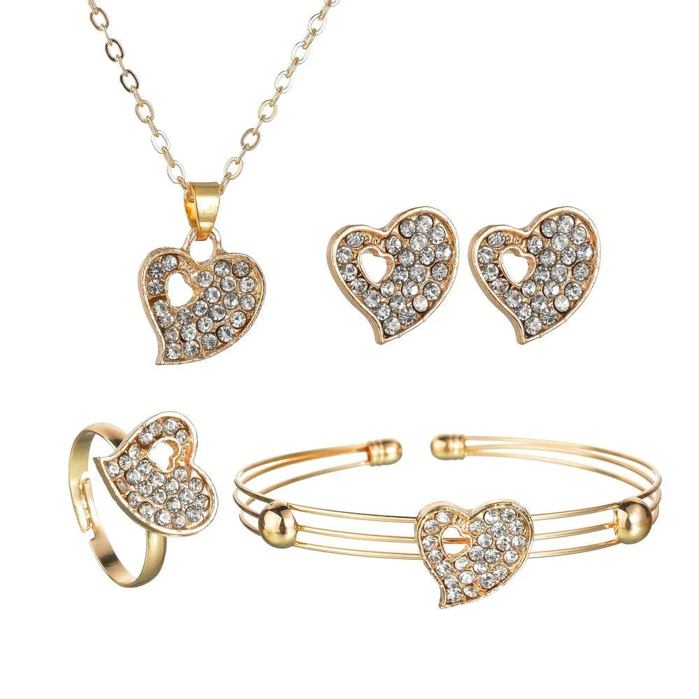 Gold electroplated alloy jewellery set with earrings, pendant, and bracelet featuring love, water drop, or bell patterns