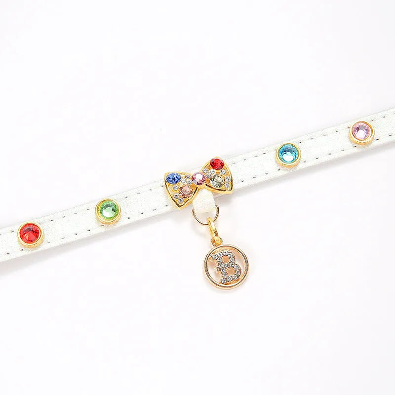 White PU cat collar with diamond alloy bow, 1.5cm wide, available in XS 26cm to L 38cm