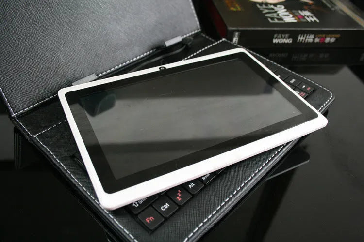 7 inch Android tablet with 8GB flash storage, quad core processor, WiFi, dual camera, plastic body, 20.0 cm x 10.0 cm x 5.0 cm