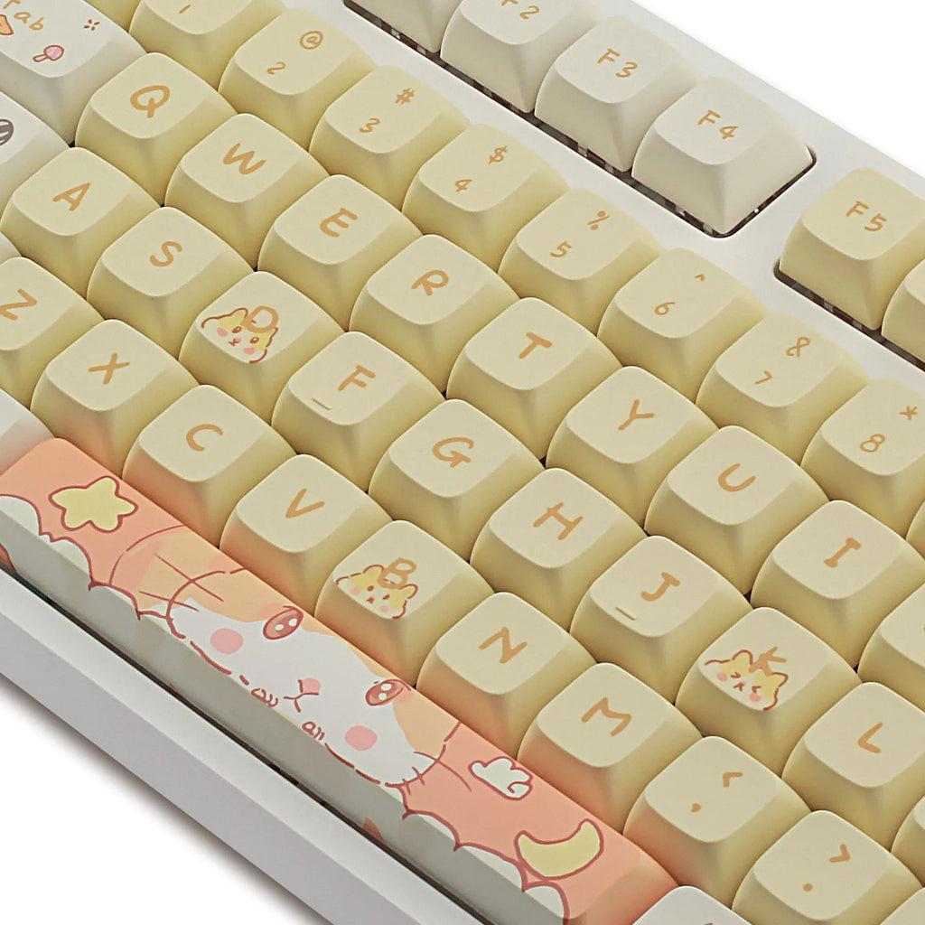 XDA profile mechanical keyboard keycaps in custard colour palette with grey and yellow accents