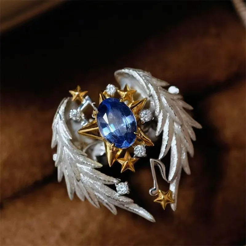 Adjustable angel wing ring with geometric design and open mouth styling